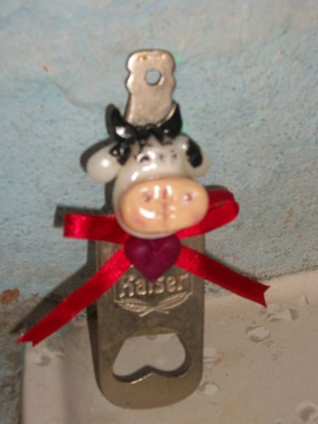 Abridor de garrafa com carinha de bicho